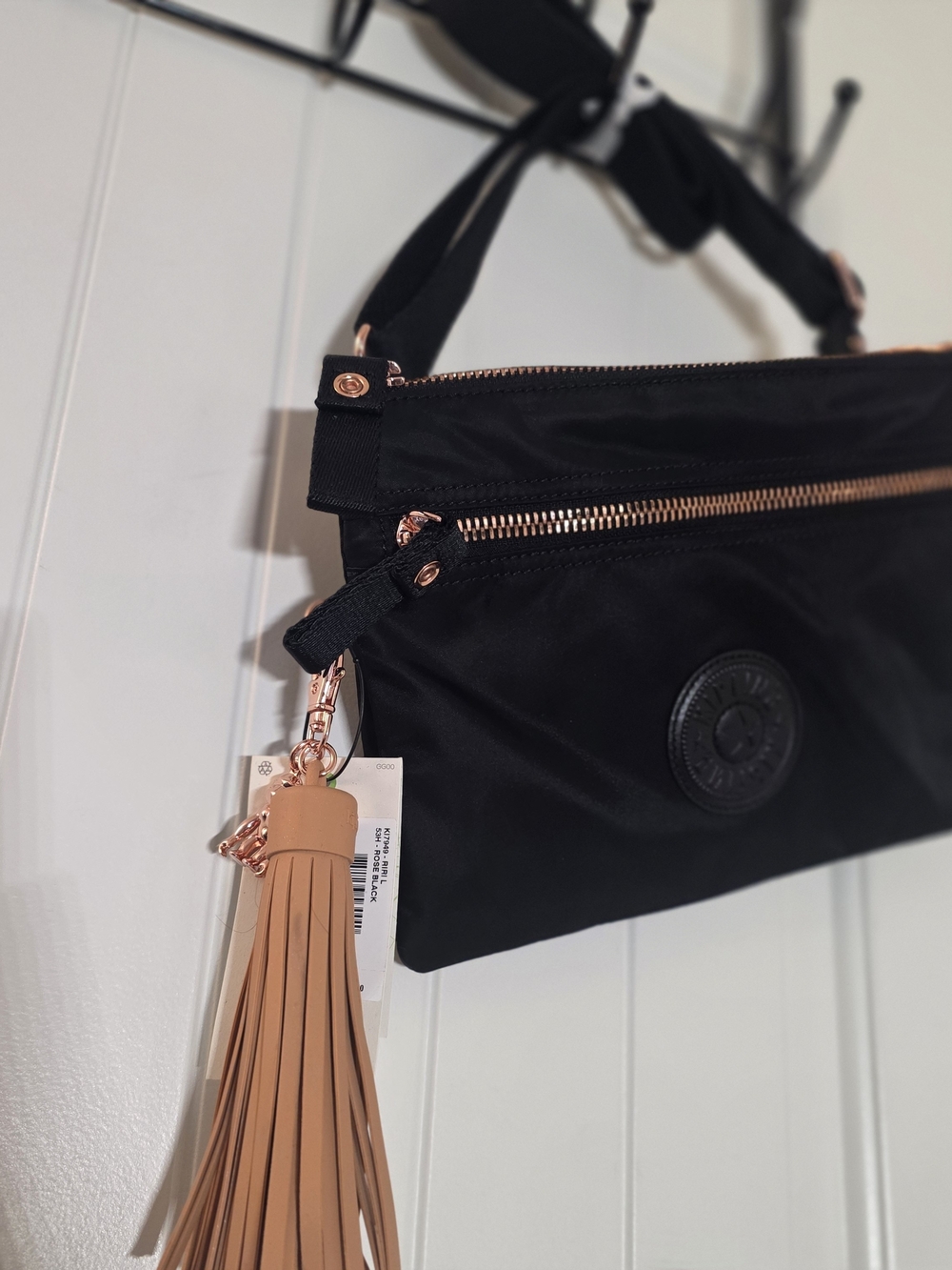 Kipling Black Crossbody with Rose Gold Hardware and Tan Tassel